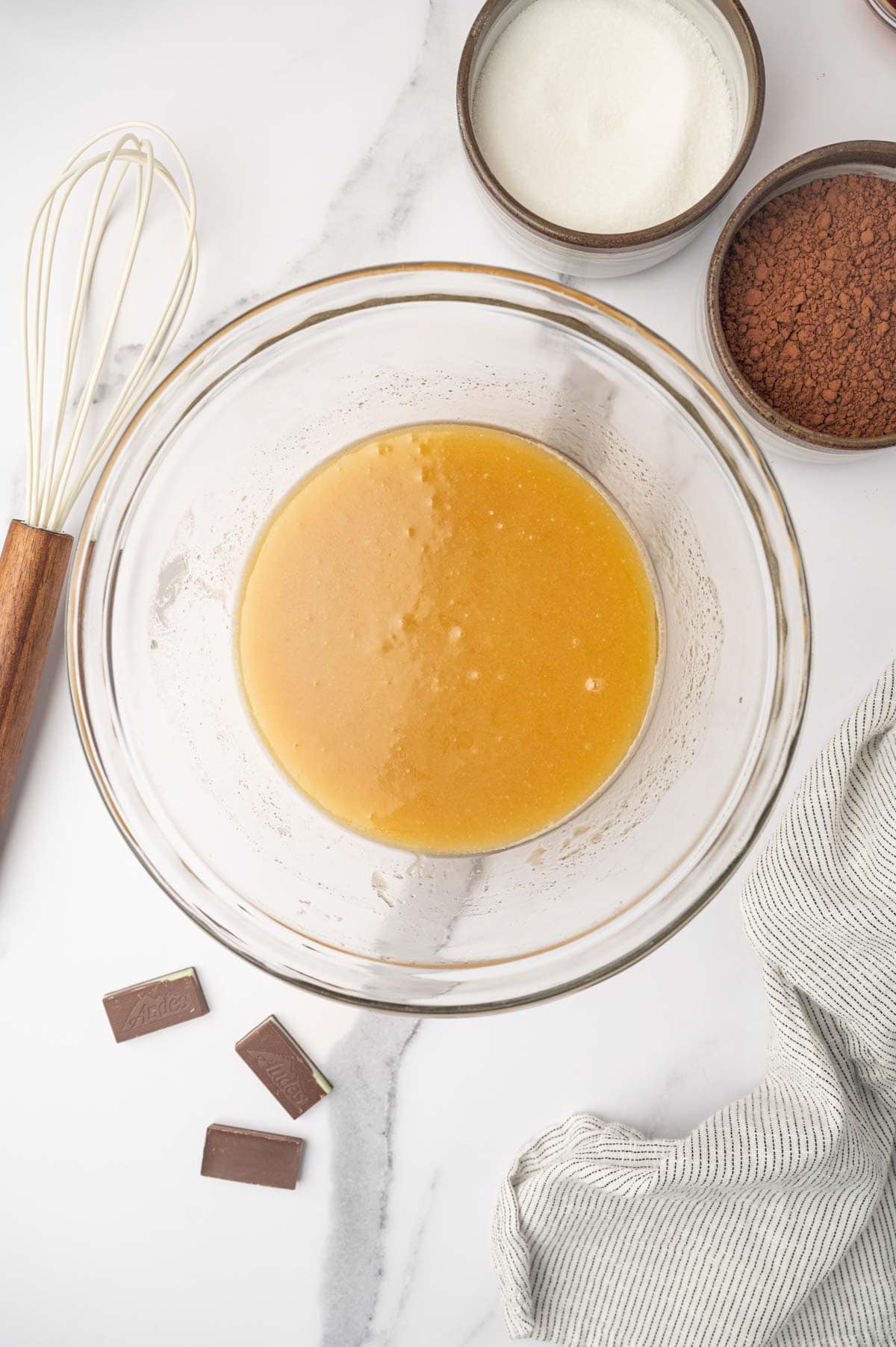 Melted butter and sugar for Andes chocolate mint brownies 