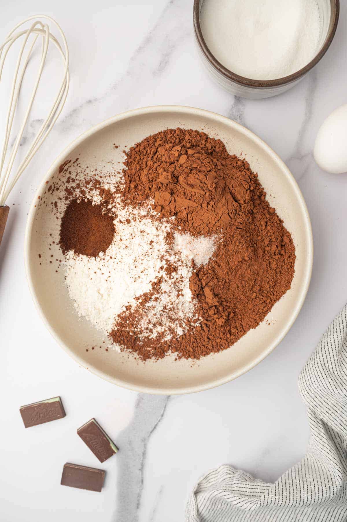 Mixing flour, cocoa and dry ingreidents for brownies