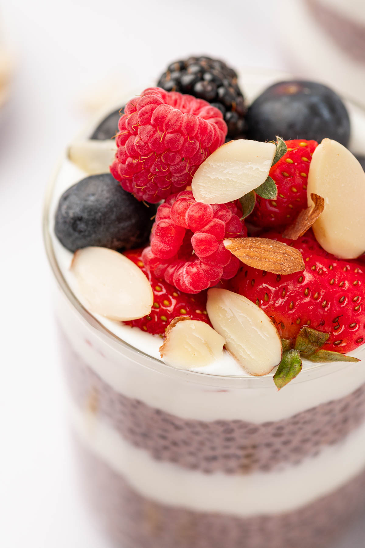 close up shot of berries in the pudding jar