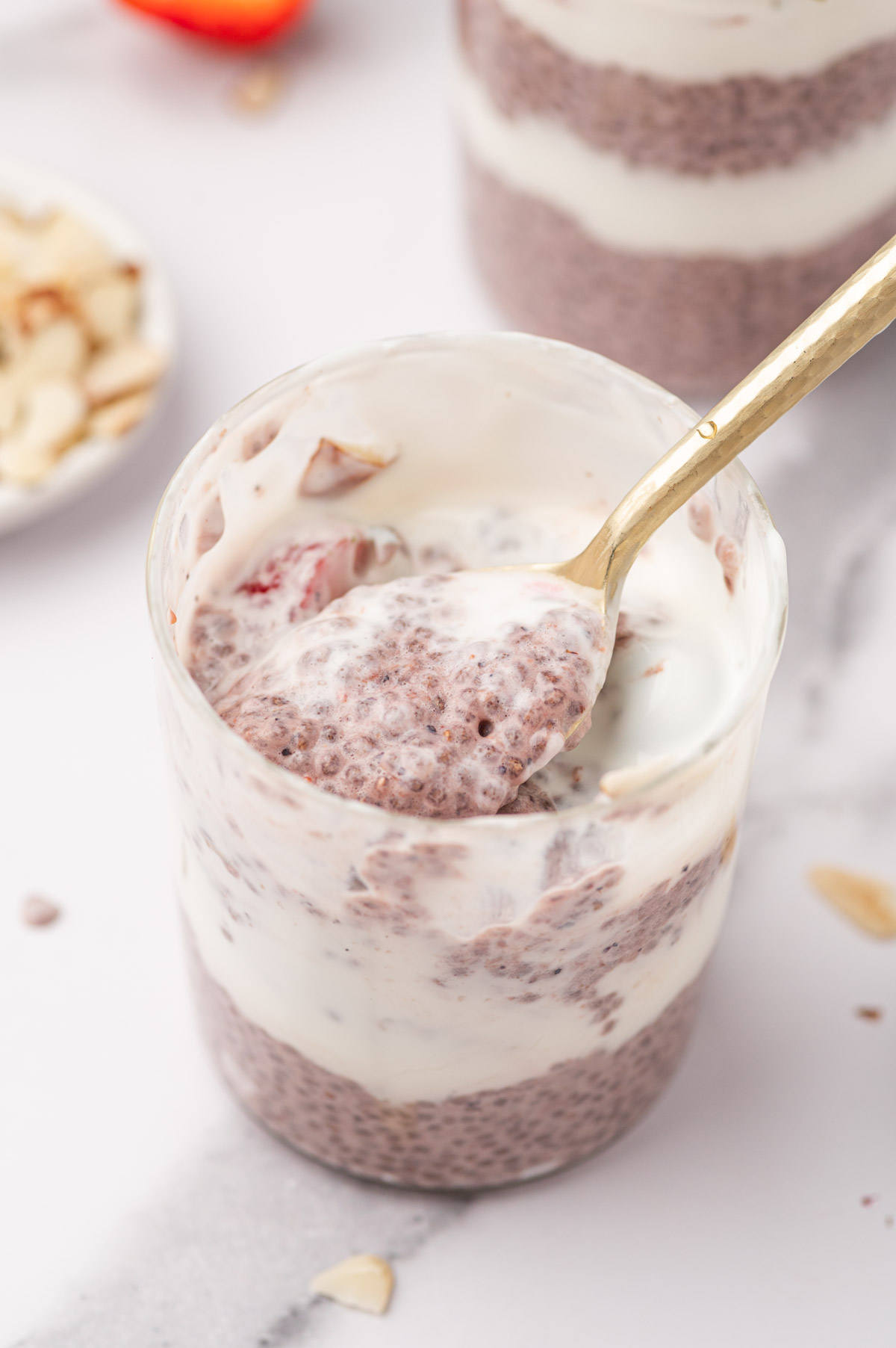 Spoon scoping out of chia seed pudding