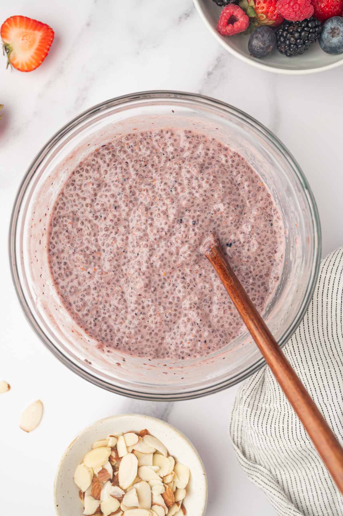 Berry chia seed pudding in a glass bowl