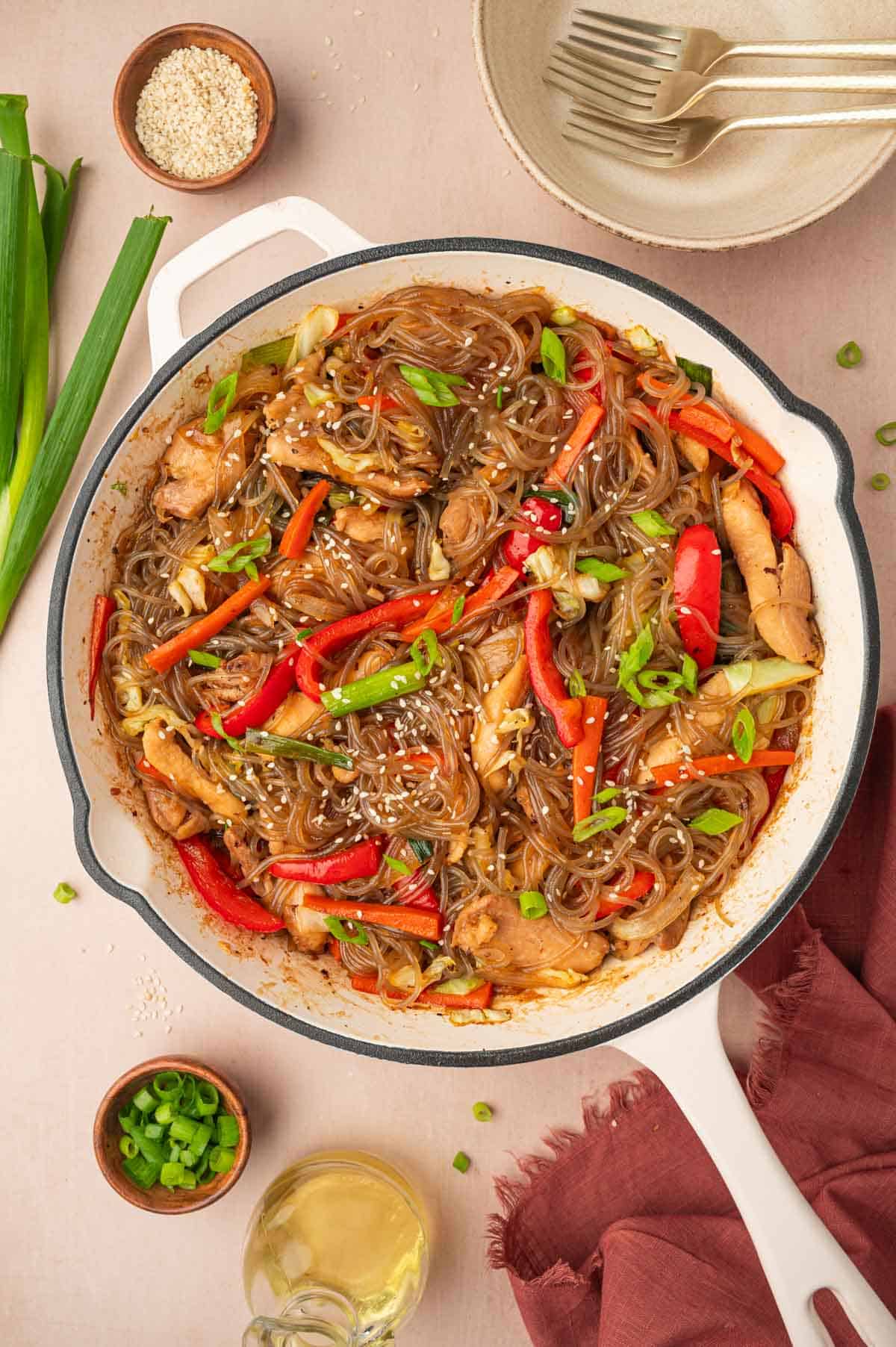 Glass noodles stir fry in a skillet