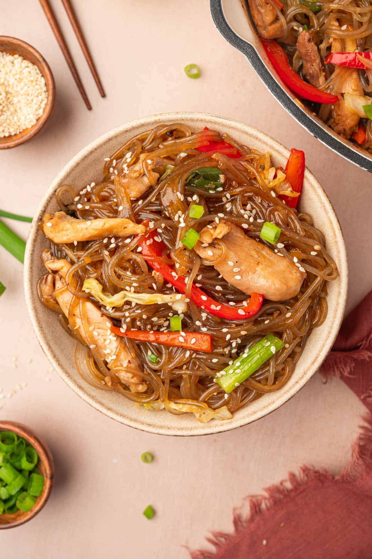 Flat lay image of chicken stir fry glass noodles