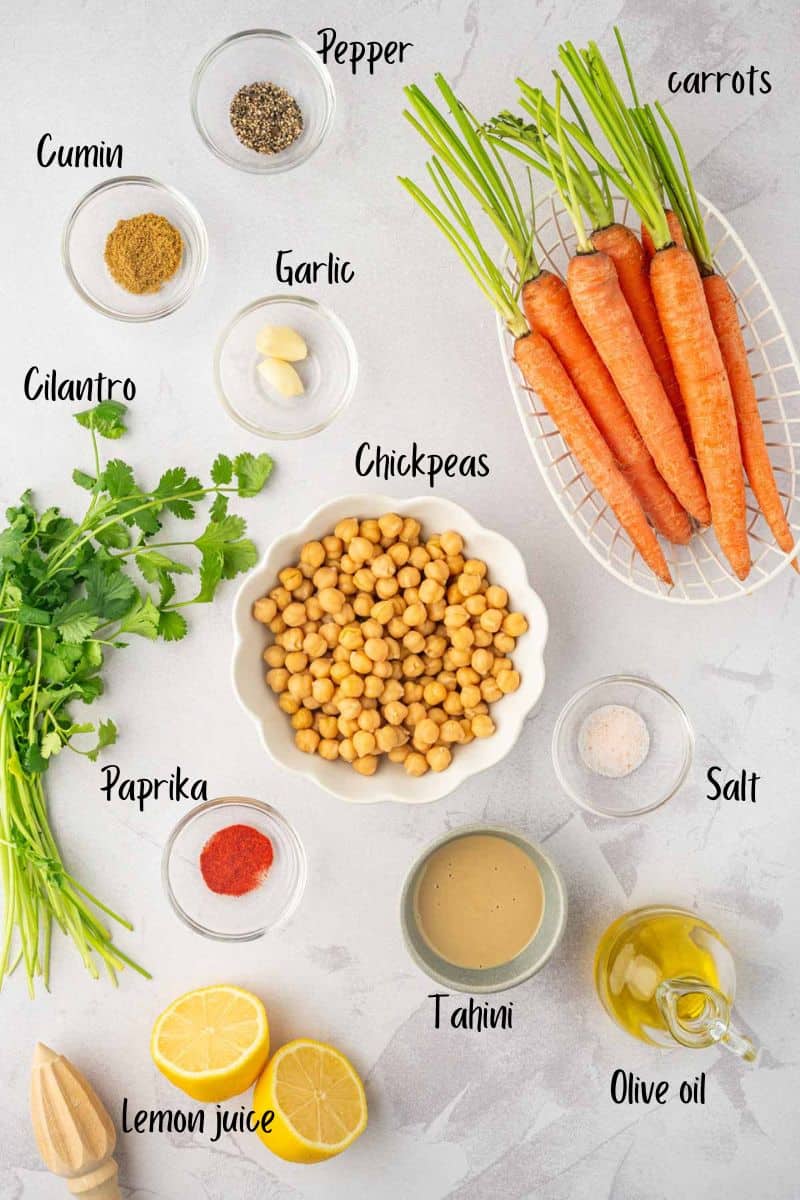 Ingredient shot of roasted carrot hummus with canned chickpeas