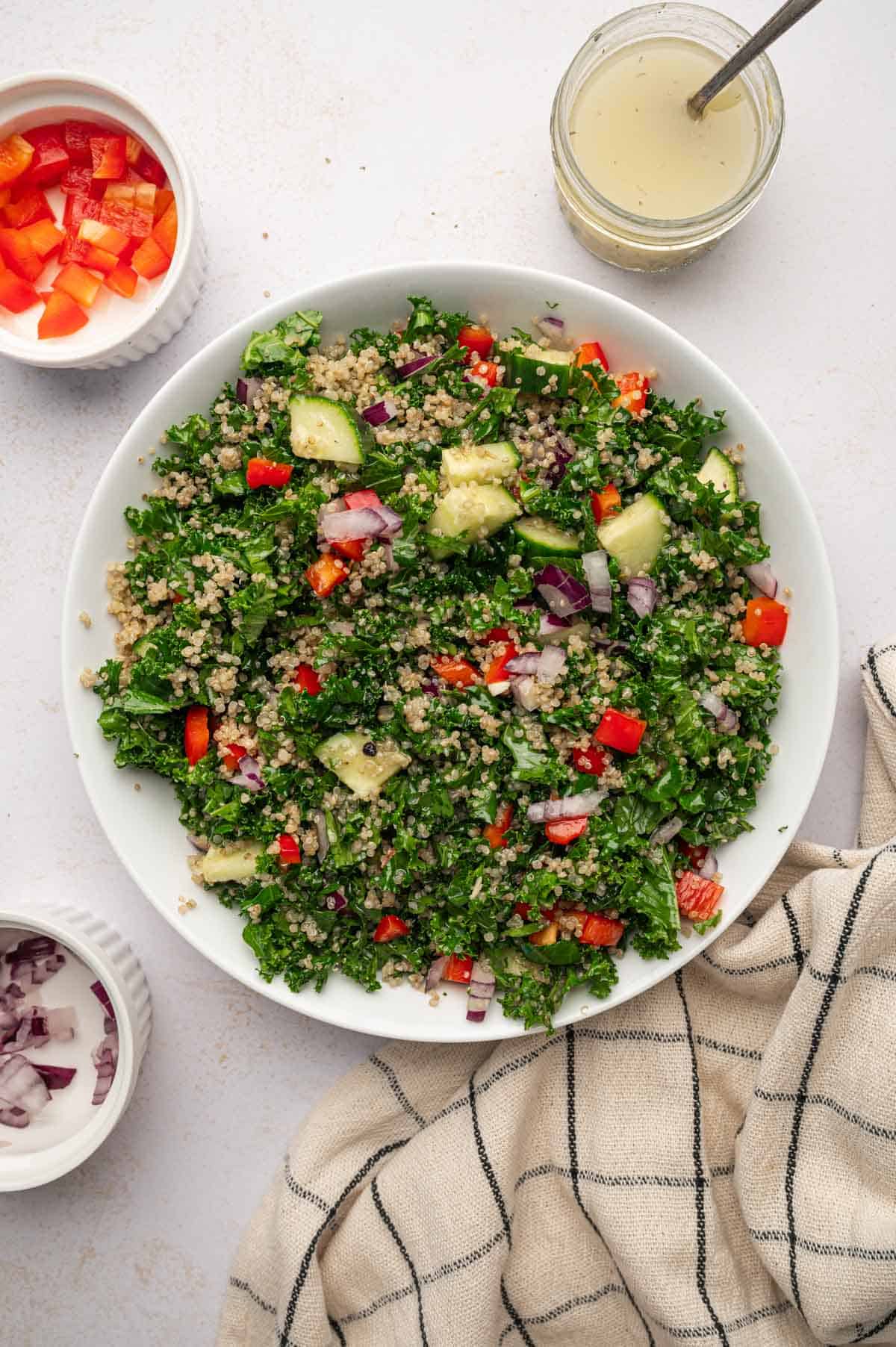 Mix the salad ingredient's for Salmon Kale Quinoa Salad