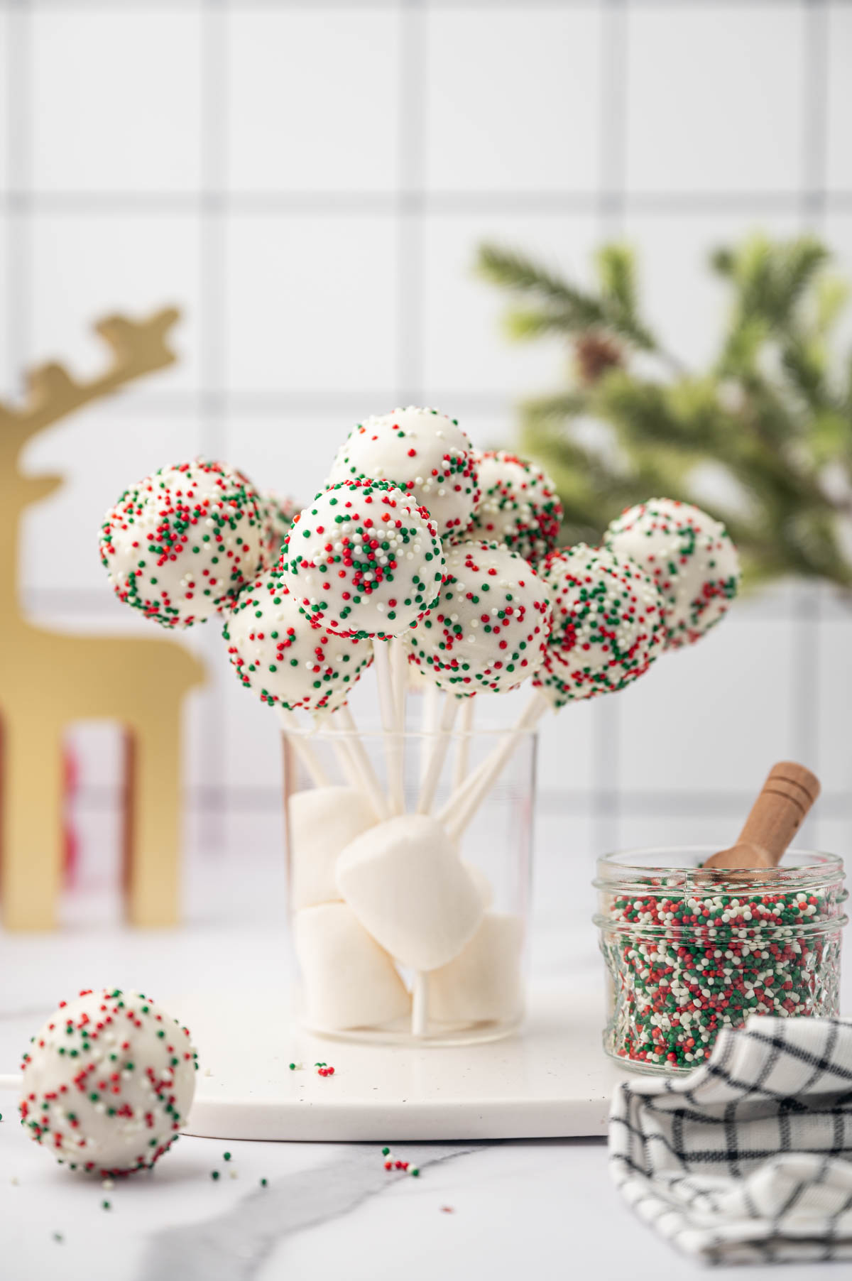 CHRISTMAS cake pops in a glass jar.