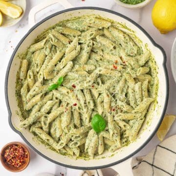 Ricotta Pesto Pasta in a white cast iron skillet