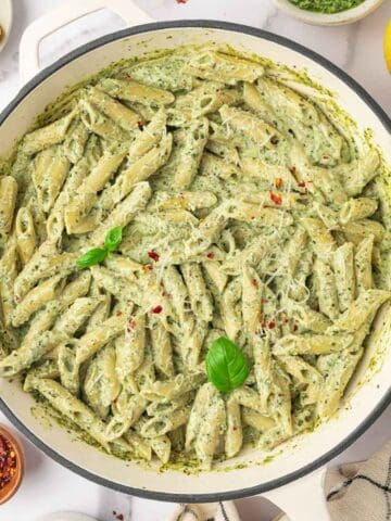 Ricotta Pesto Pasta in a white cast iron skillet