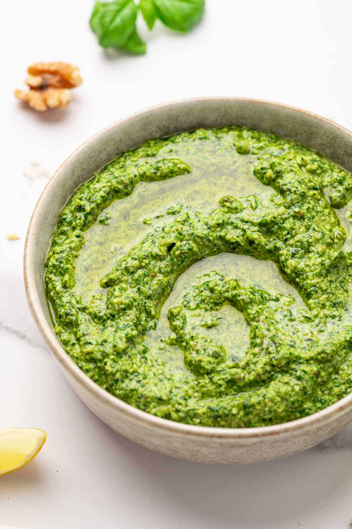 Backlight shot of homemade pesto without pine nuts