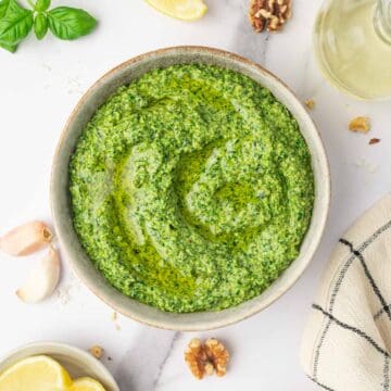 Easy Pesto without Pine nuts feature image in a gray white bowl