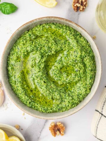 Easy Pesto without Pine nuts feature image in a gray white bowl