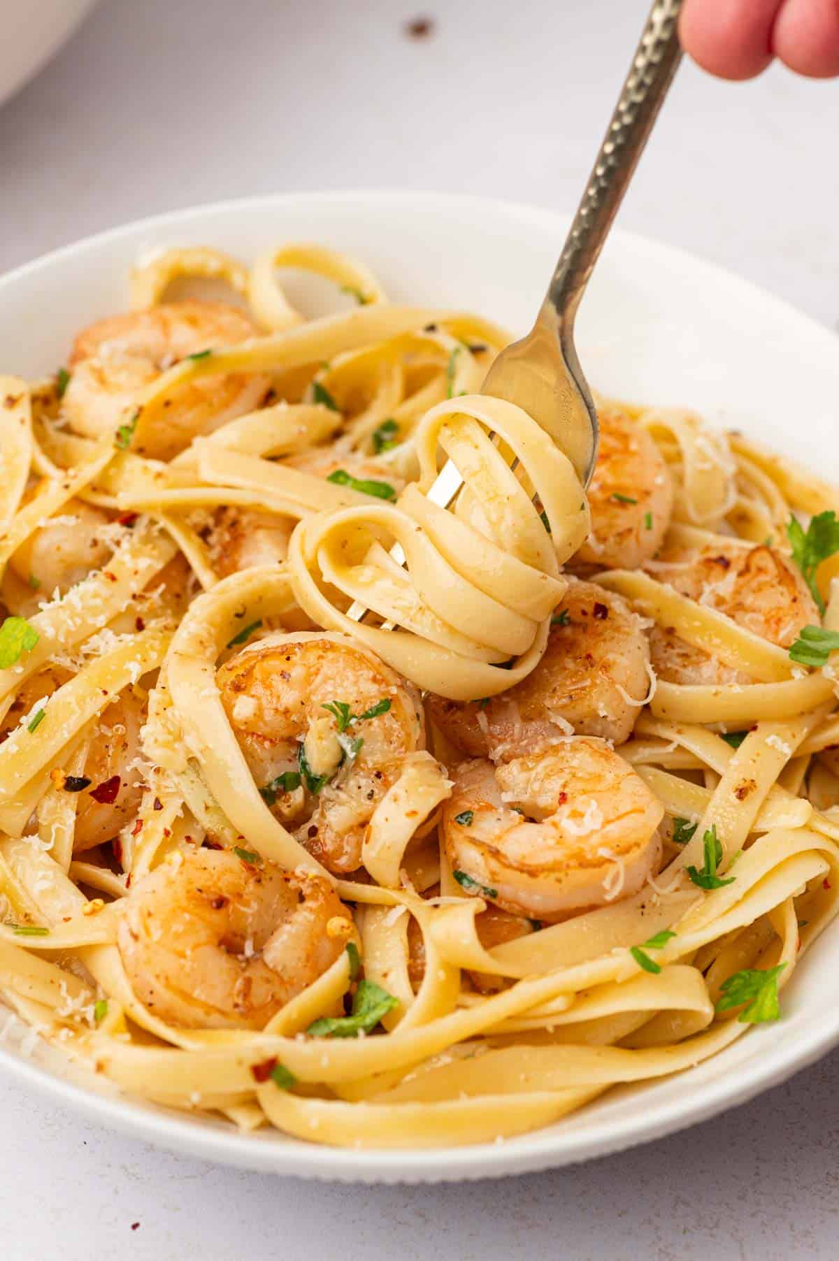 Easy shrimp scampi fettuccine in a fork