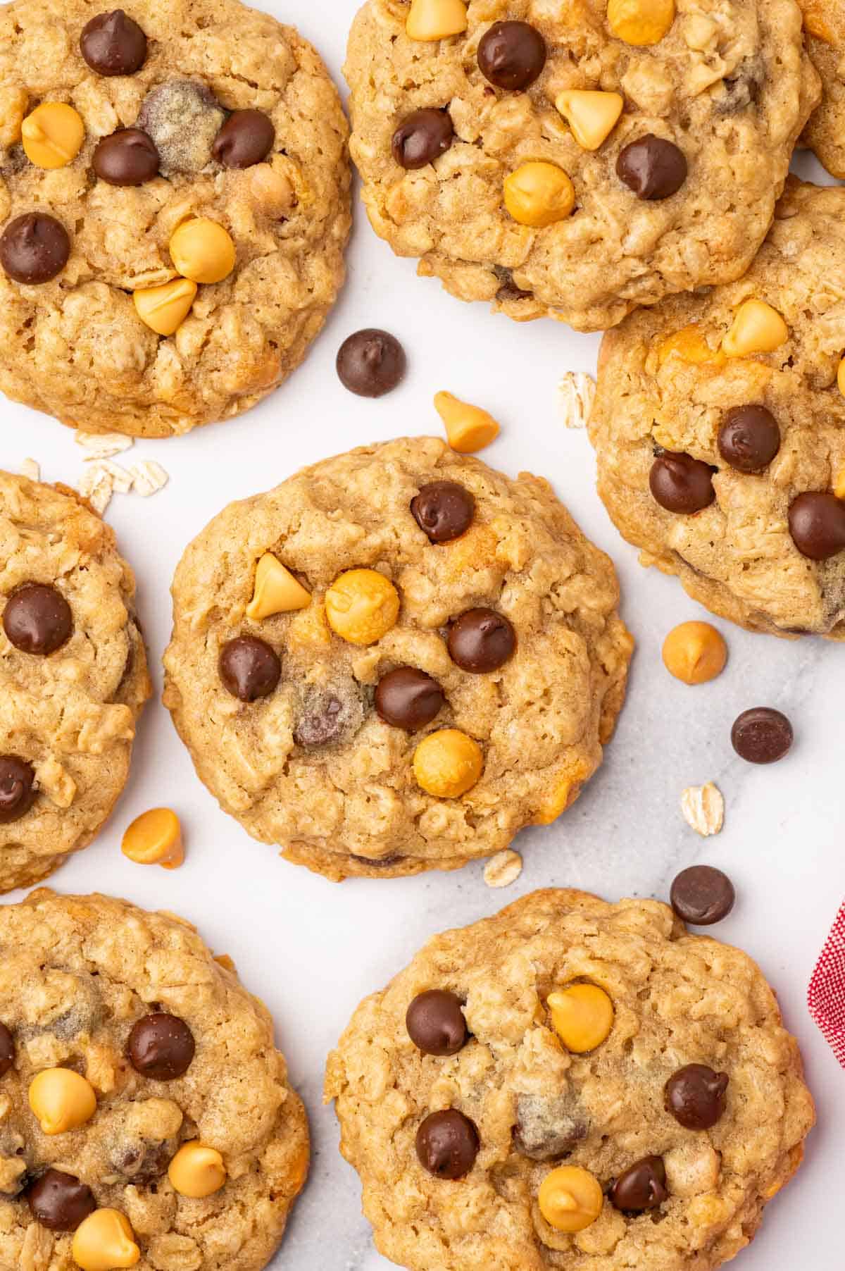 Butterscotch chocolate chip oatmeal cookies arranged in a marble table