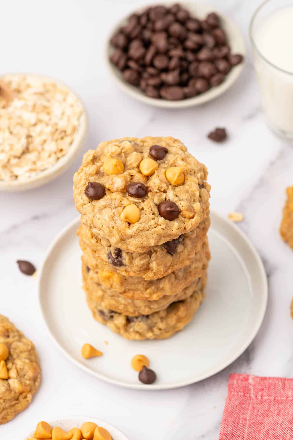 Oatmeal butterscotch chocolate chip cookies served with a glass of milk