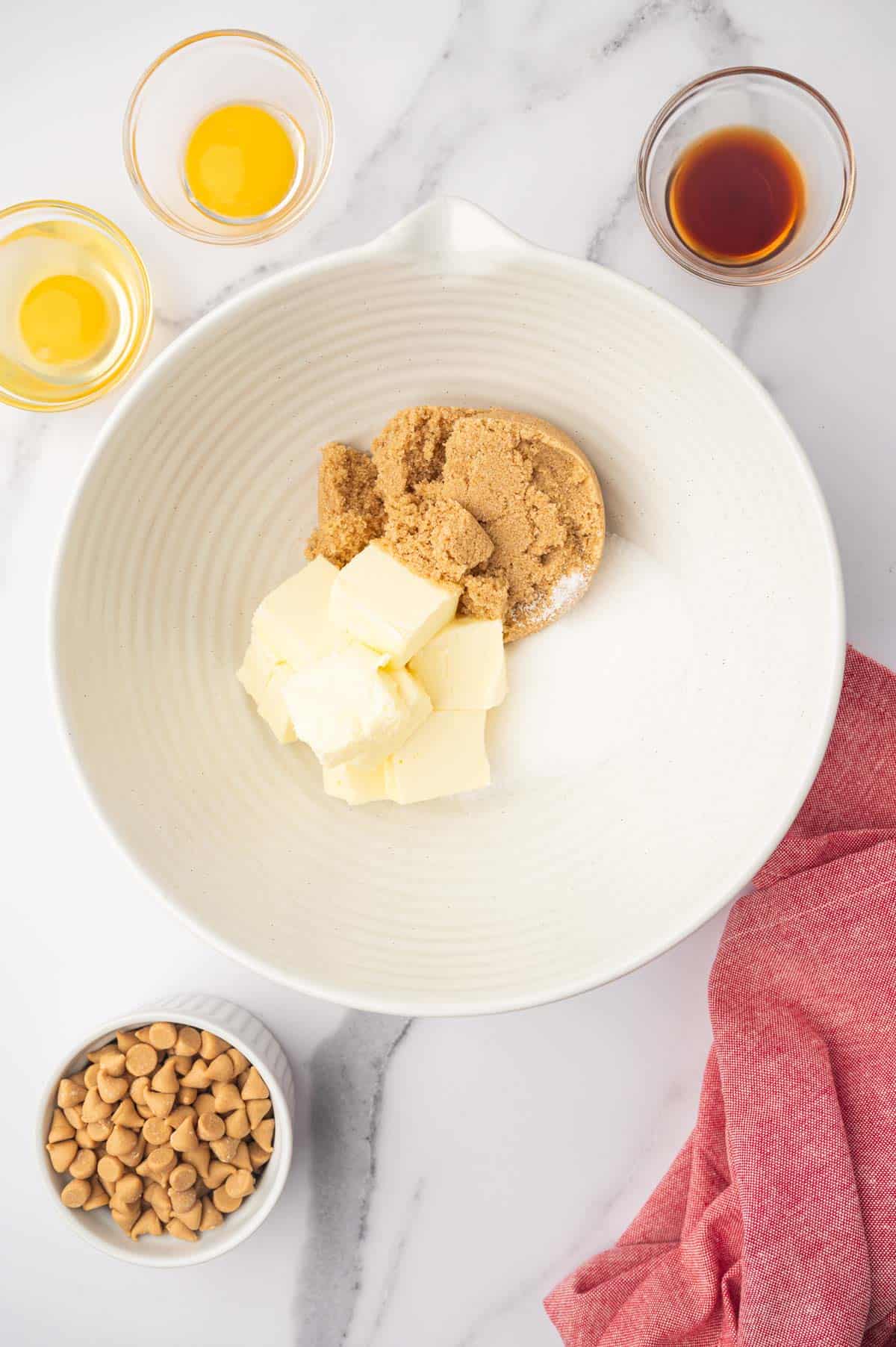 Combine butter, brown sugar and butter for Oatmeal butterscotch chocolate chip cookies