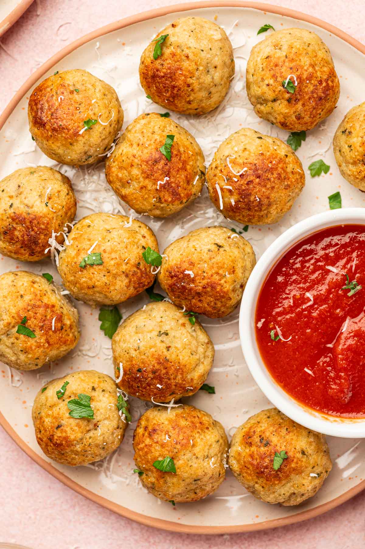 Chicken meatballs served as a appetizer along with the marinara sauce.