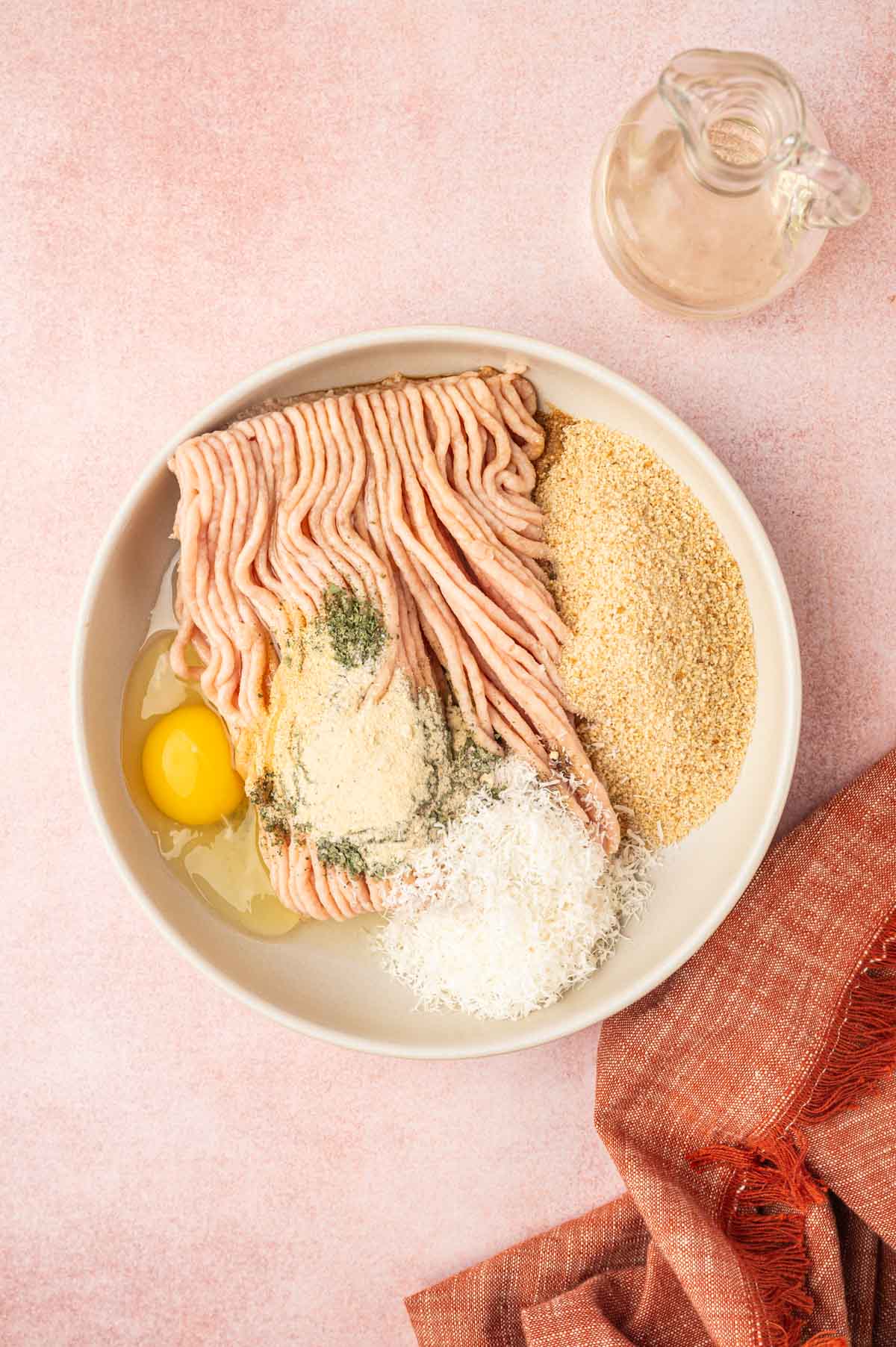 Ingredients mixed in a bowl for air fryer chicken meatballs.