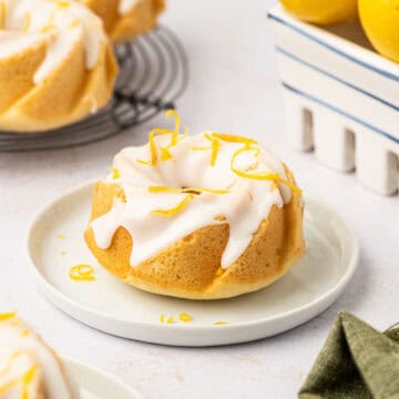 mini lemon bundt cake in a white plate.