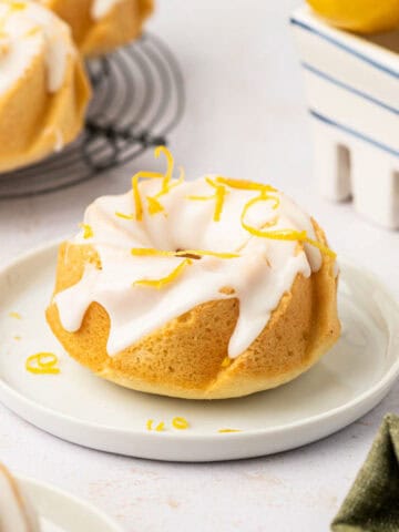 mini lemon bundt cake in a white plate.