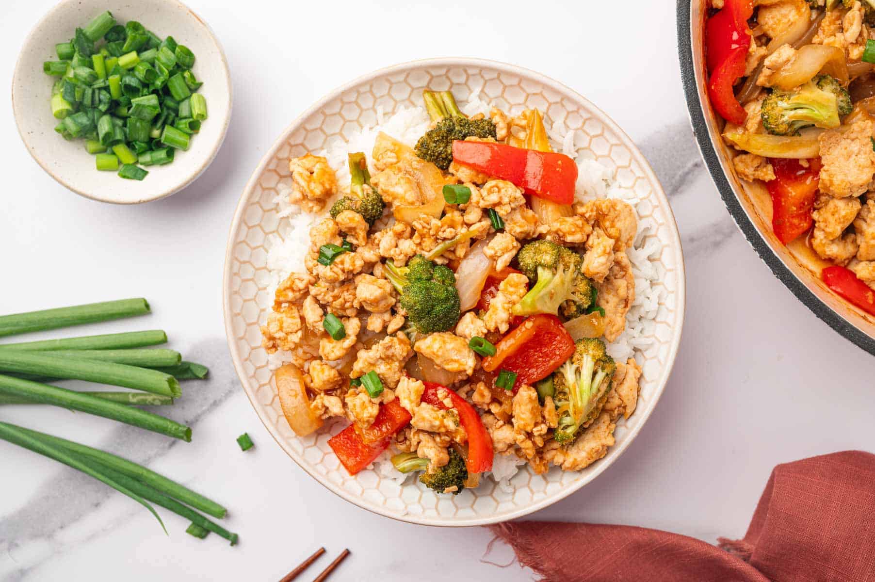 Easy chicken dinner with gorund chicken stir fry in a bowl.