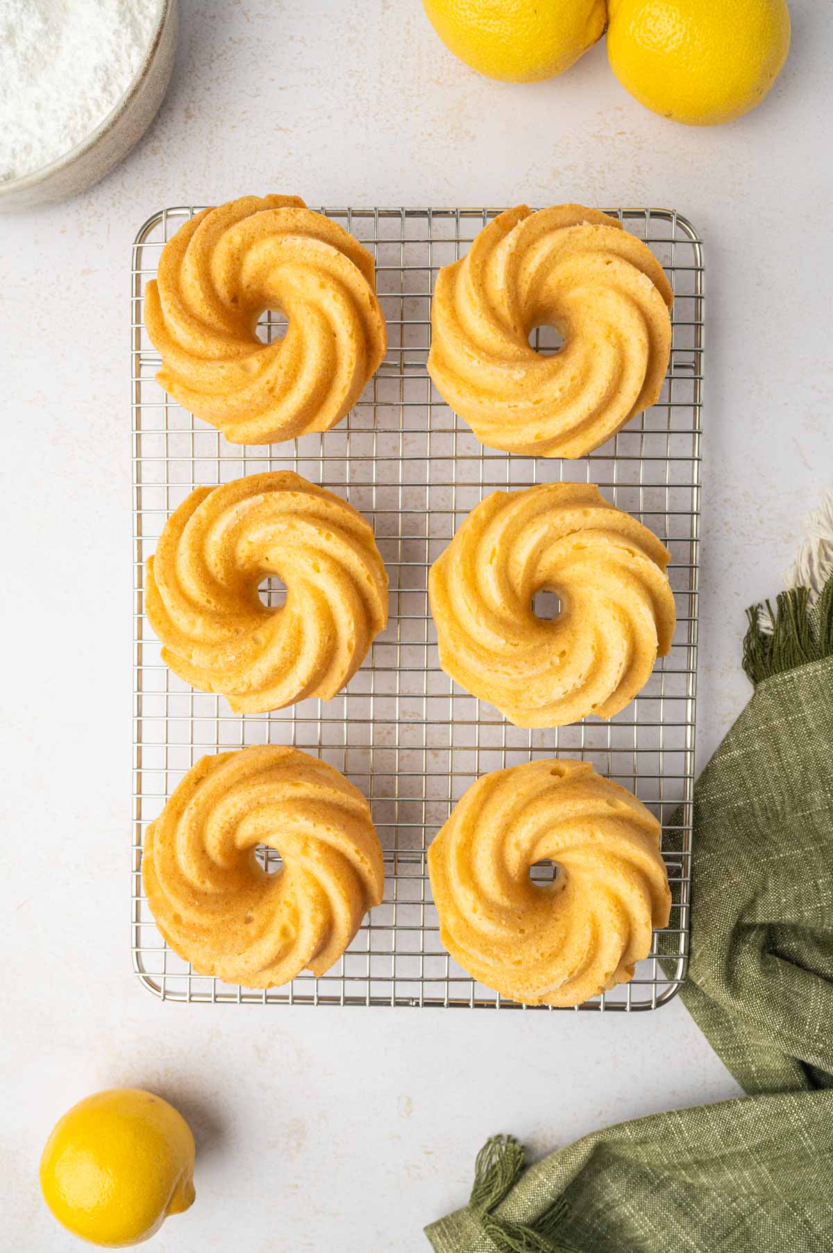 Baked mini bundt cakes cooled in the wire rack.