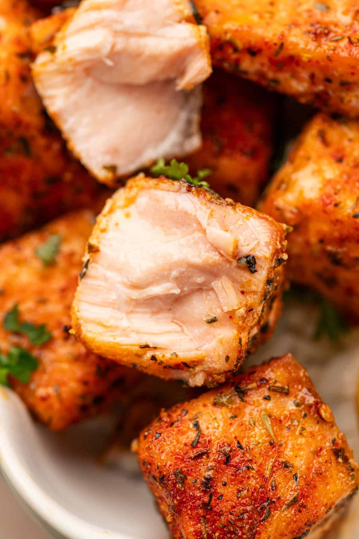 CLose up shot of blackened salmon bites.