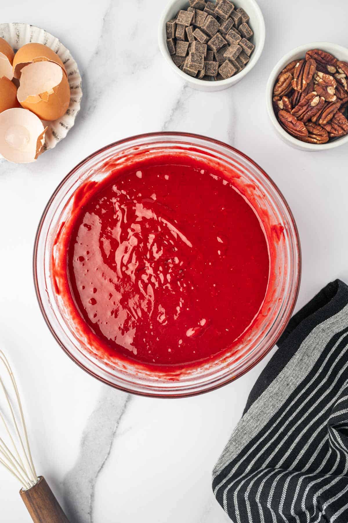 Red Velvet cake mix waffles batter in a bowl.