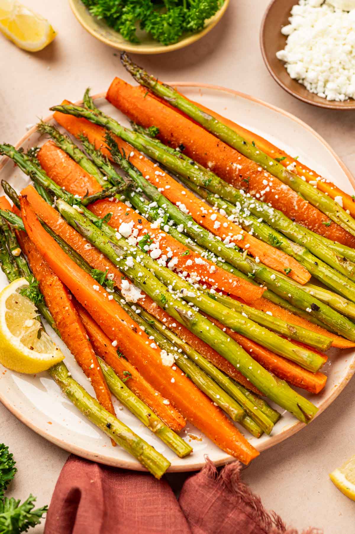 Roasted asparagus and carrots in a plate.