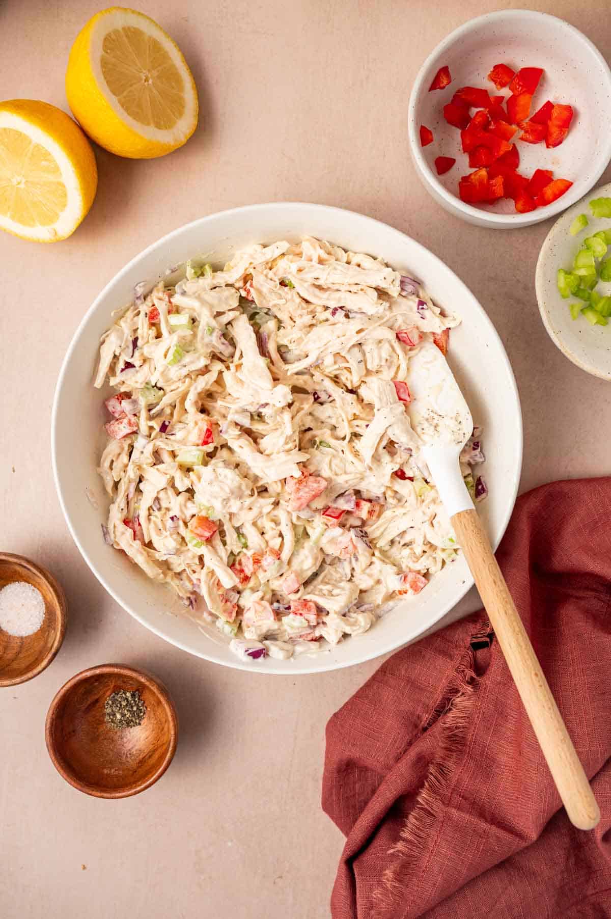Chicken salad mixture mixed well in a bowl.