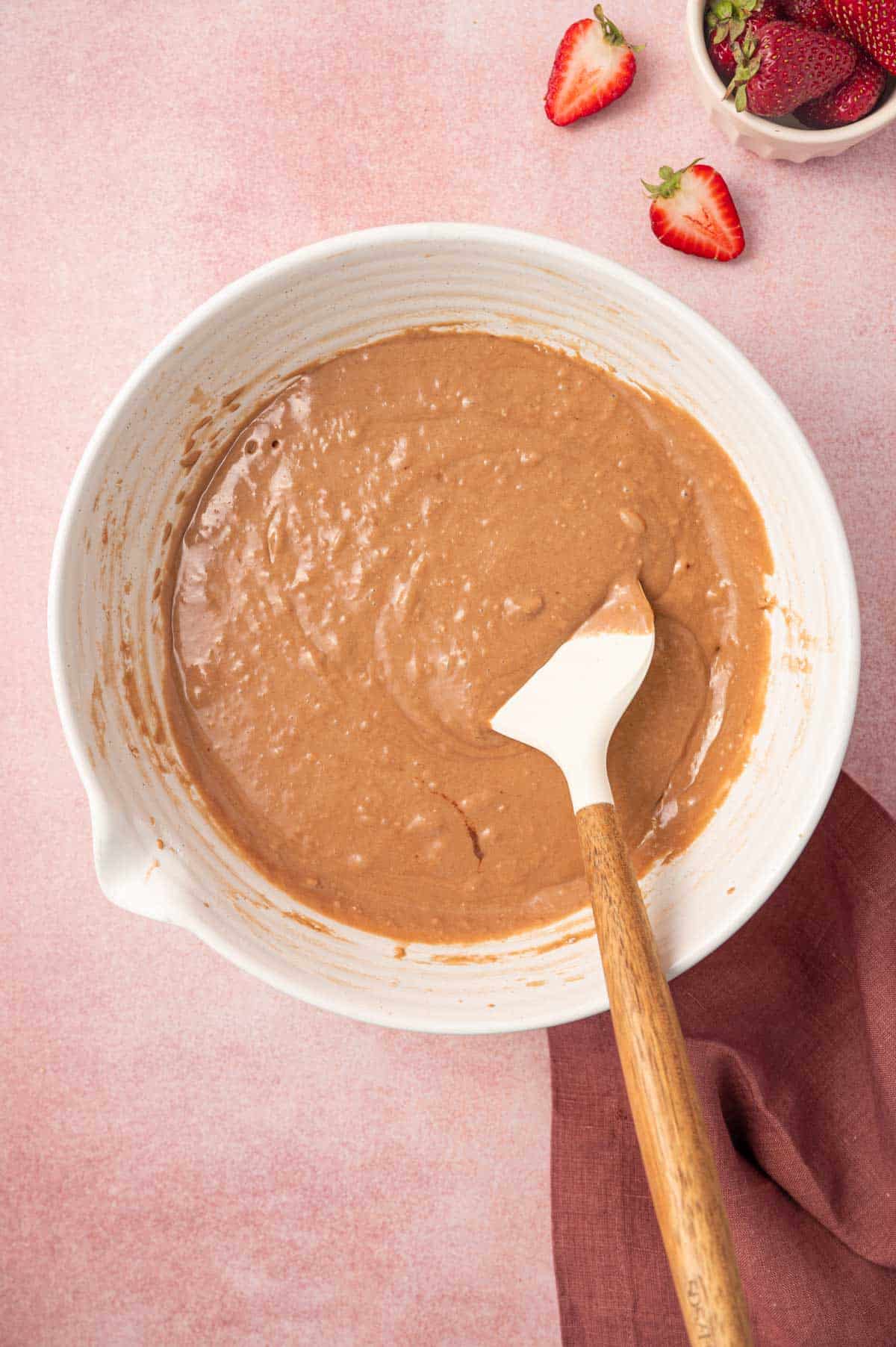 The nutella waffle batter in a large bowl.