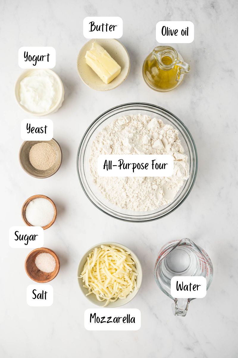 Ingredients laid out for making cheese stuffed naan bread.
