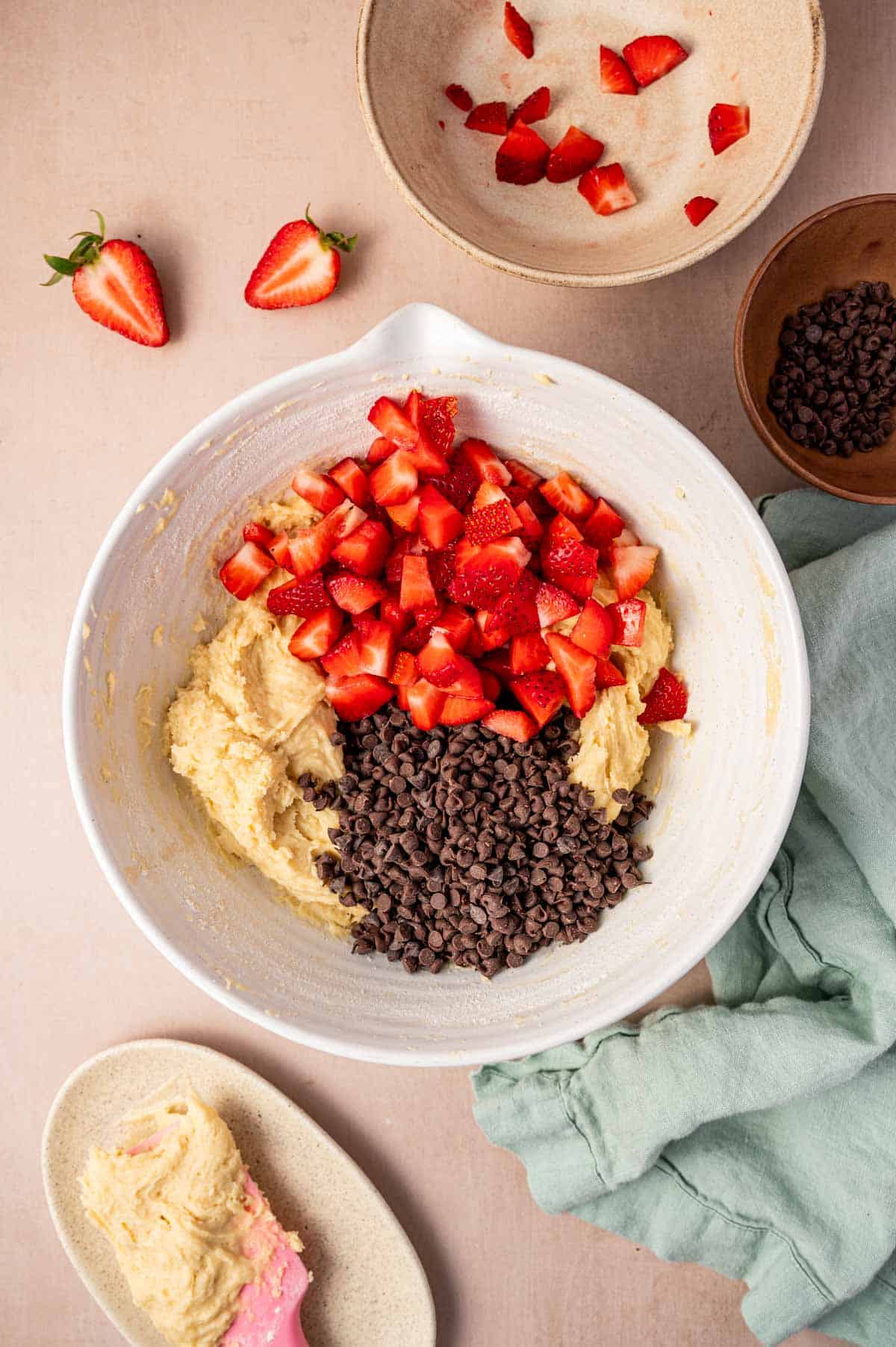 Chopped strawberries and mini chocolate chips added to the muffin batter.