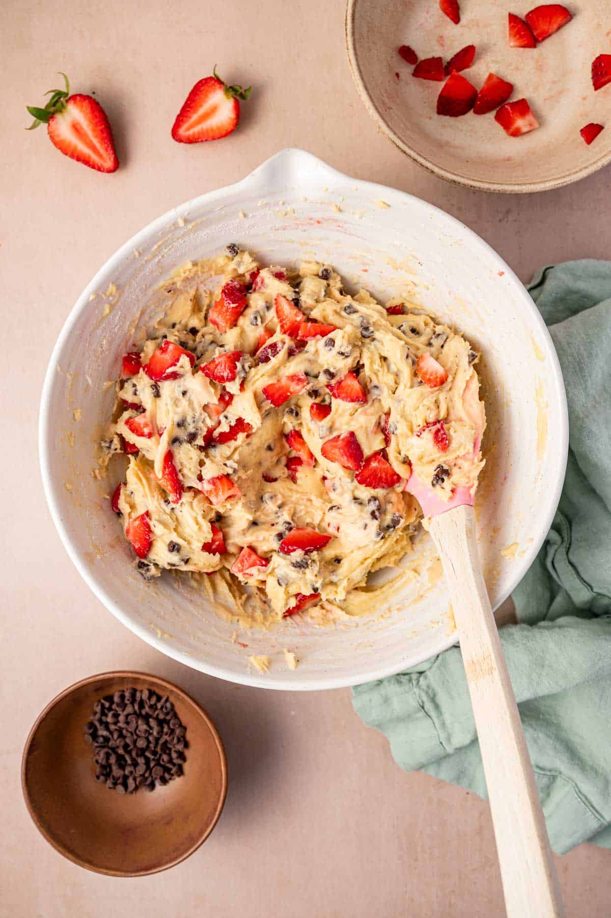 In a large bowl the strawberry chocolate chip muffin batter is ready to bake.