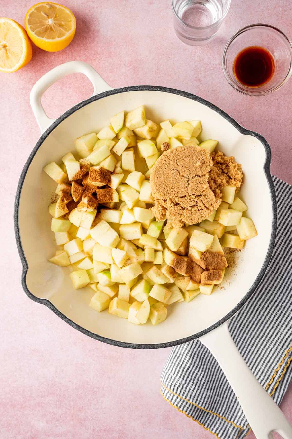 In a skillet apples are added to make apple pie filling along with cinnamon , brown sugar, etc.,