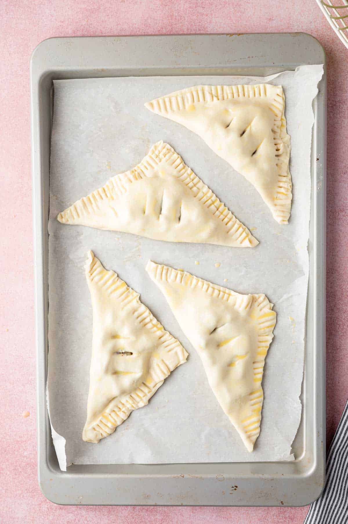 Apple pie turnovers are ready to bake.