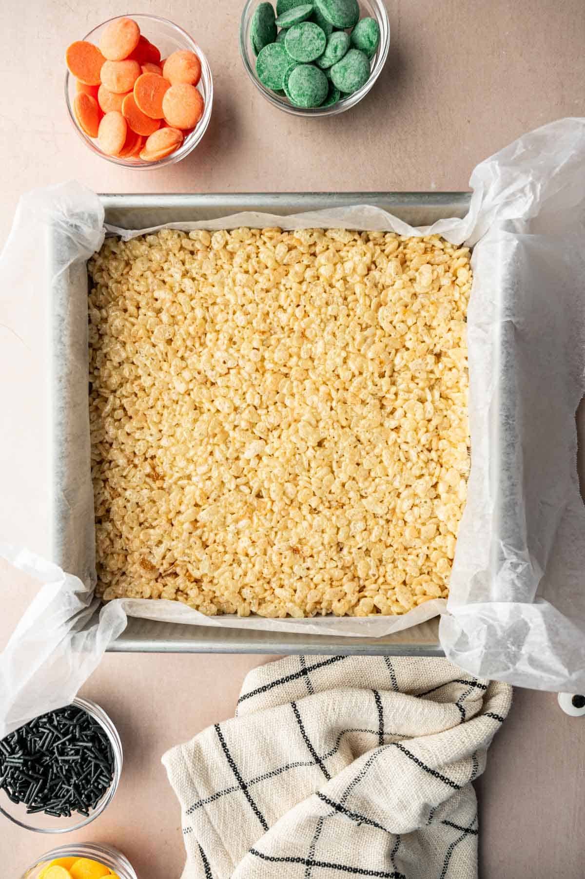 Rice krispie treats in a square pan.