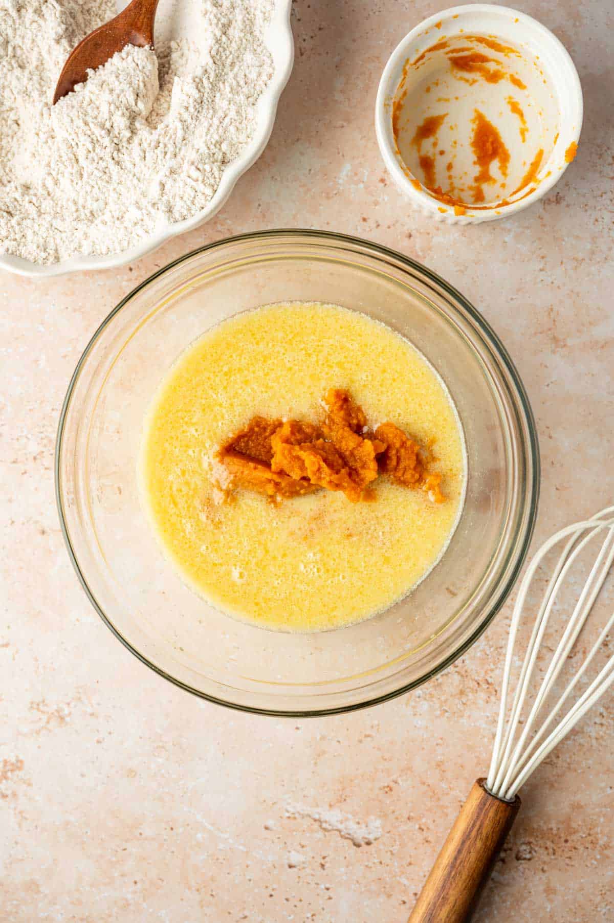 Combine the wet ingredients to make homemade pumpkin waffles with pecans