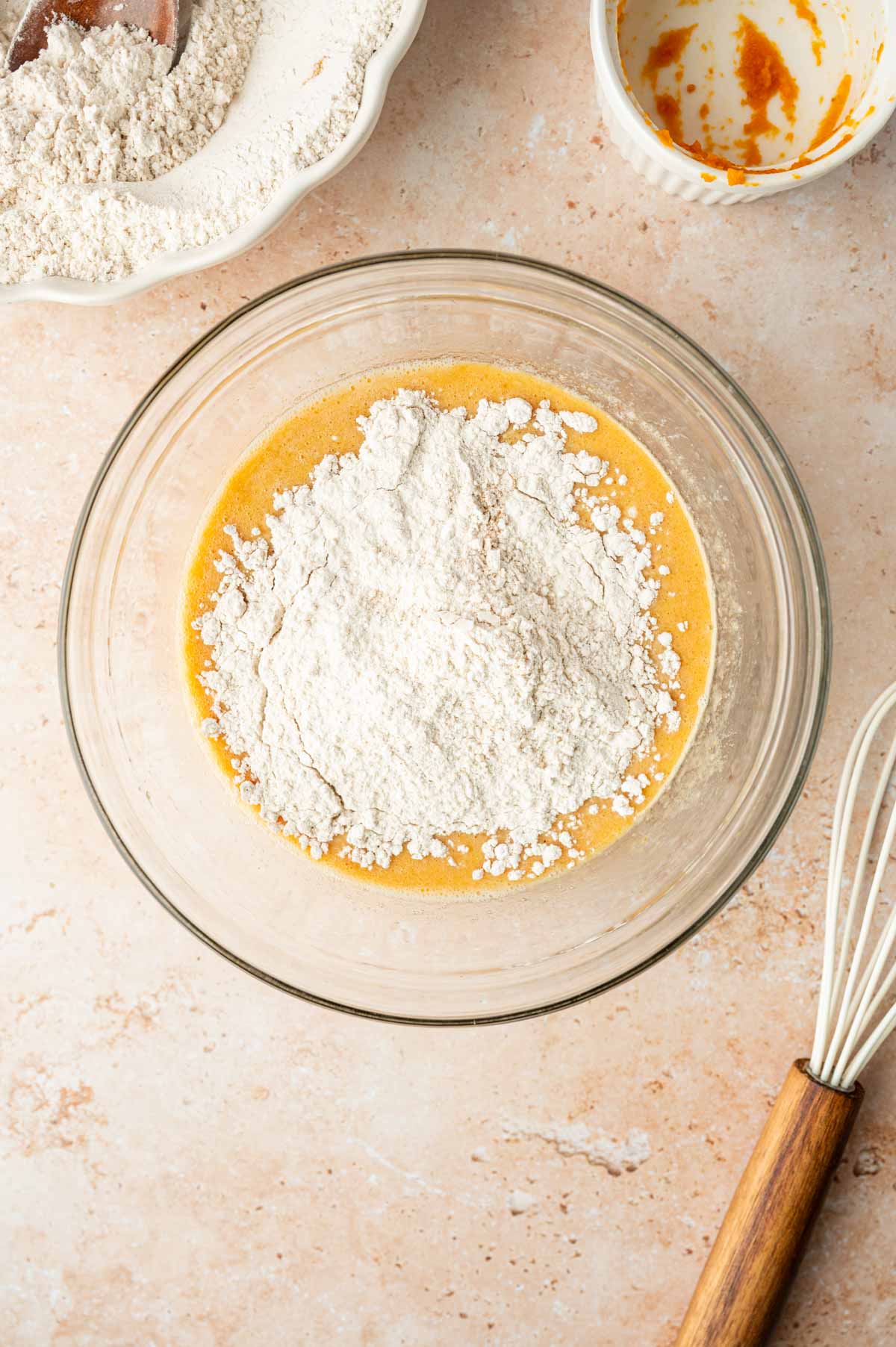 Dry ingredients being added to the wet mixture.