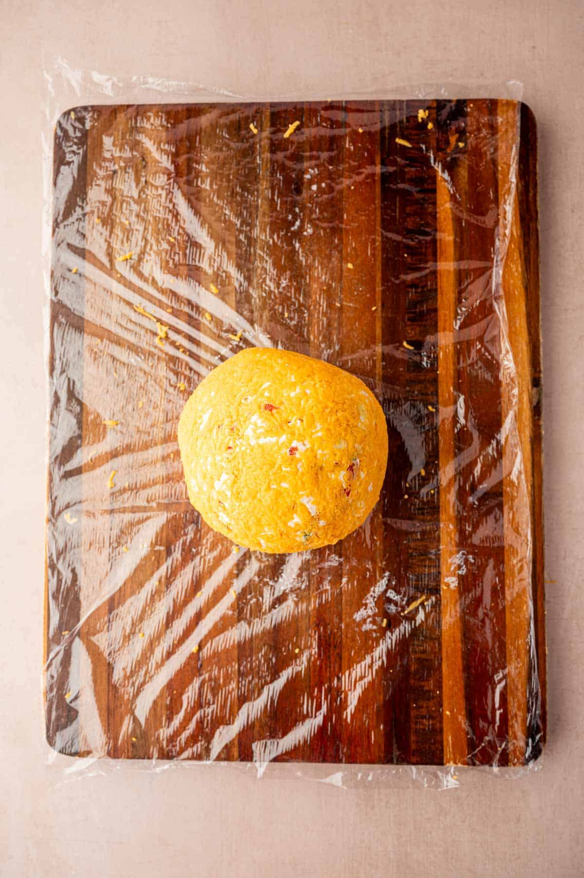 Shape the cheese ball to round.