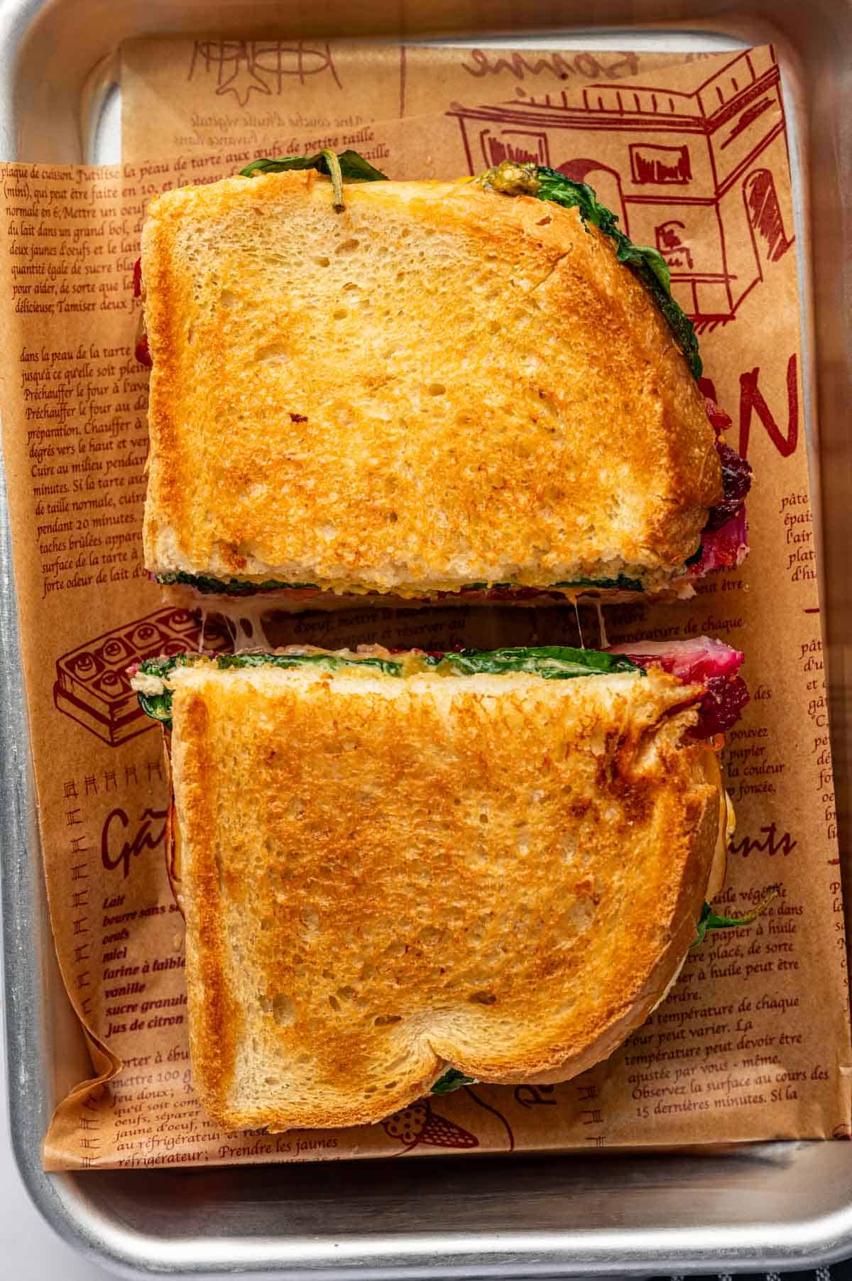 Easy air fryer turkey melt with gooey cheese and homemade cranberry relish, perfect for leftover turkey.