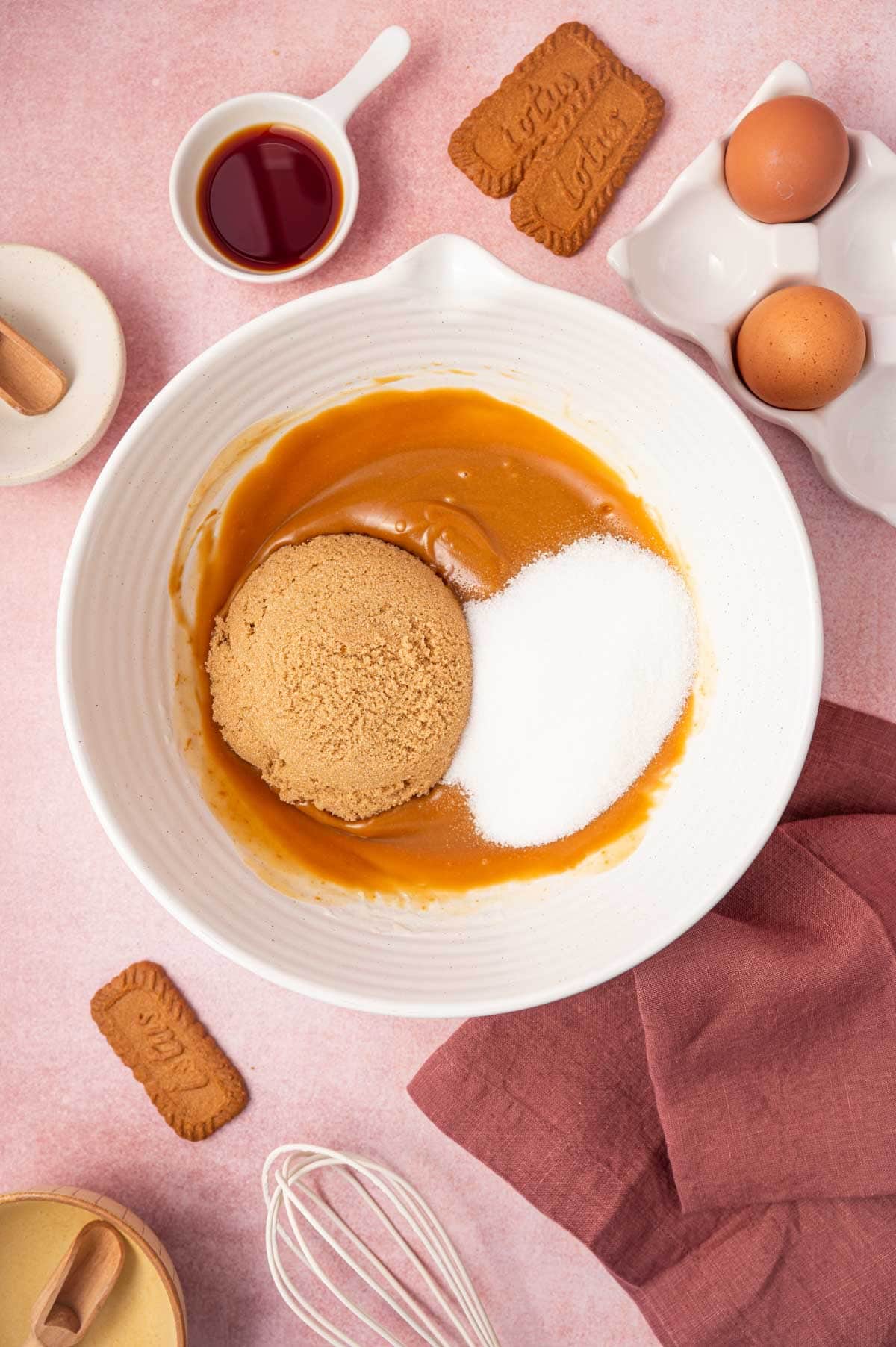Sugars being added to the biscoff mixture.