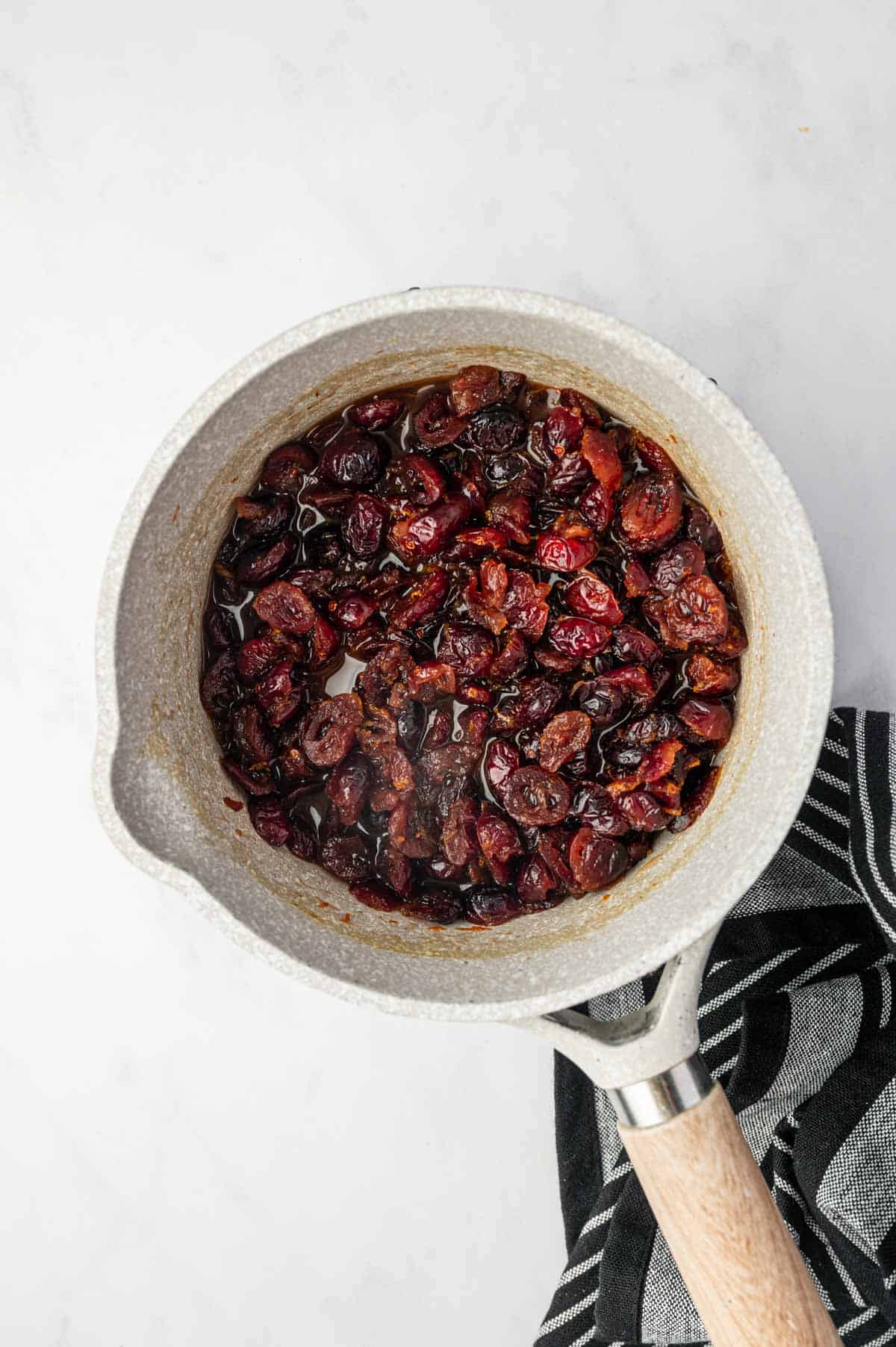 The dried cranberries being pulmped up.