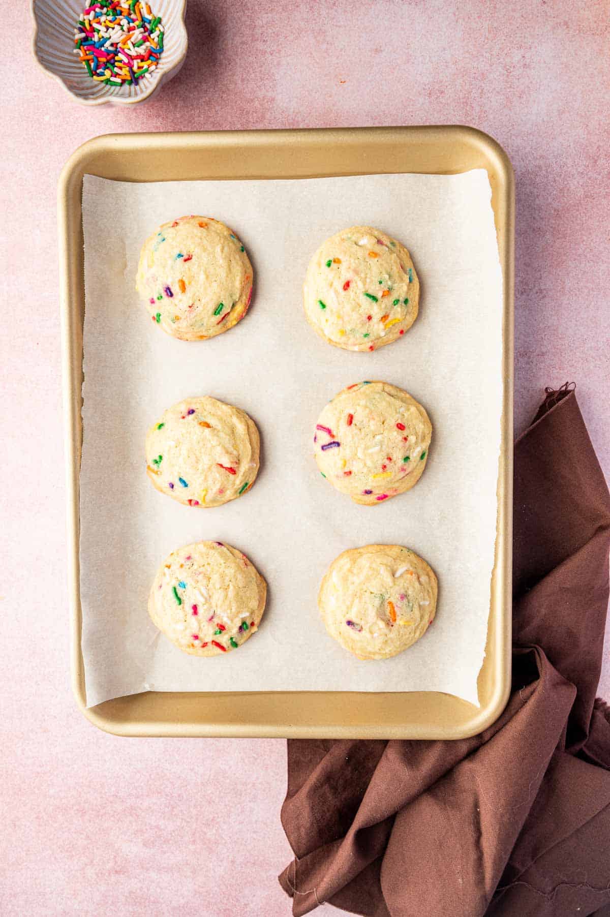 Baked funfetti birthday cake cookies just out from the oven and cooling.