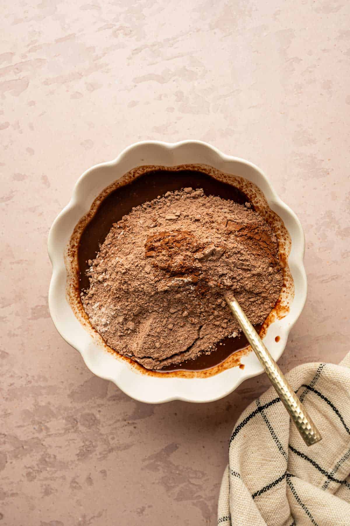Nutella and wet ingredients stirred into mug cake batter until smooth