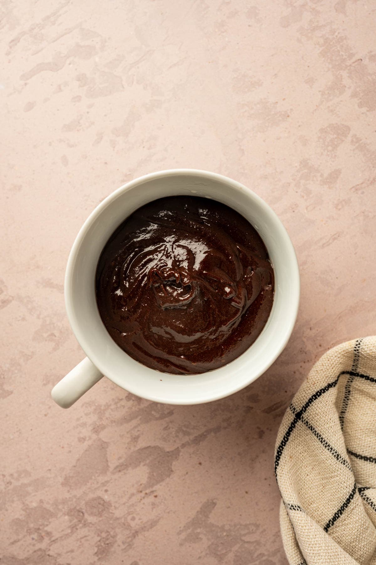 Nutella mug cake in a mug before microwaving for 60 seconds