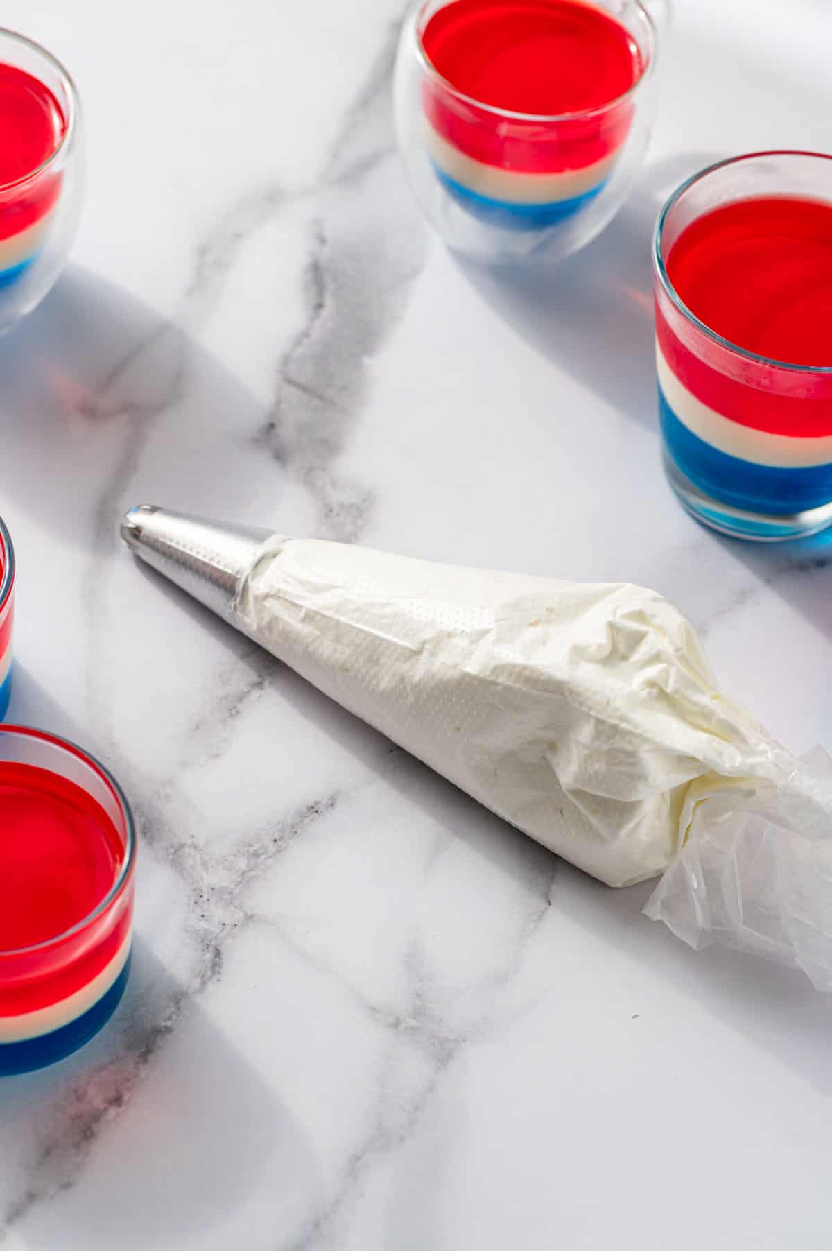 Whipped cream in a piping bag ready to decorate