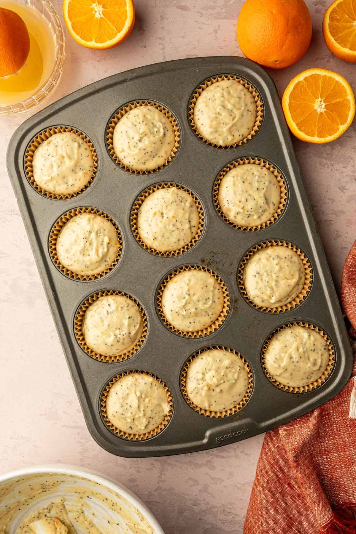 The orange poppy seed muffins are ready to bake.
