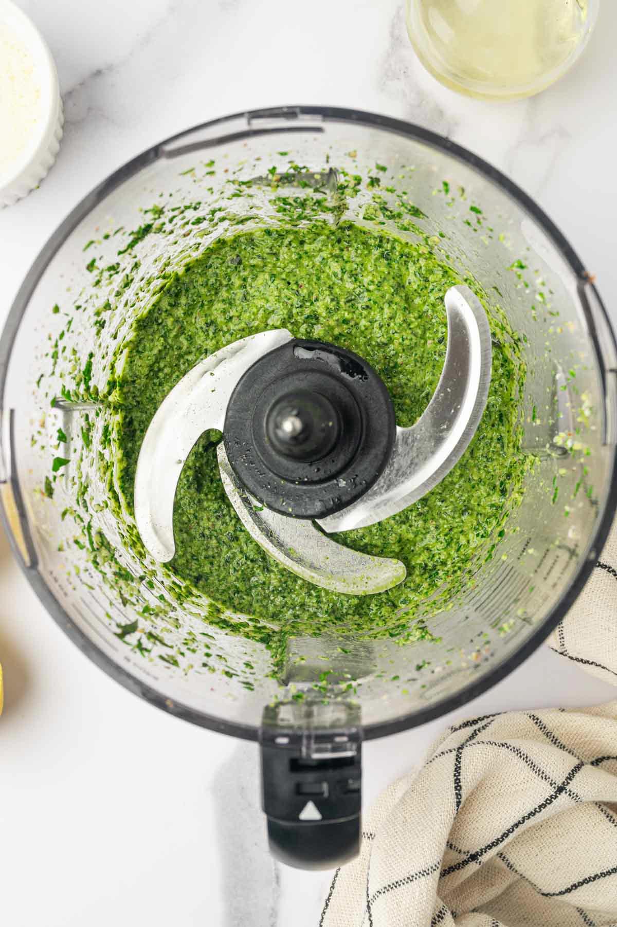 blending pesto without pine nuts in a food processor