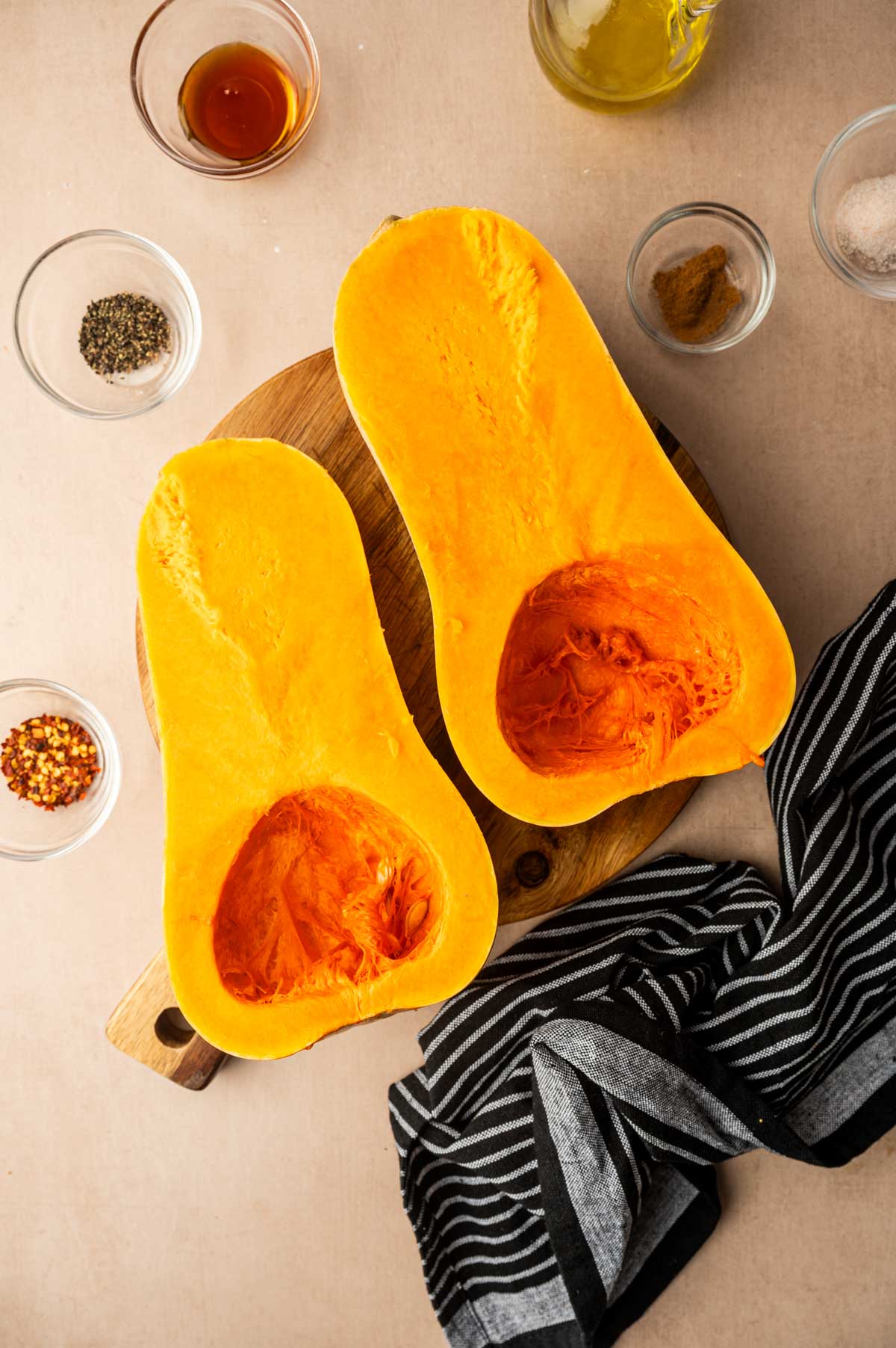Cut the butternut squash into halves.