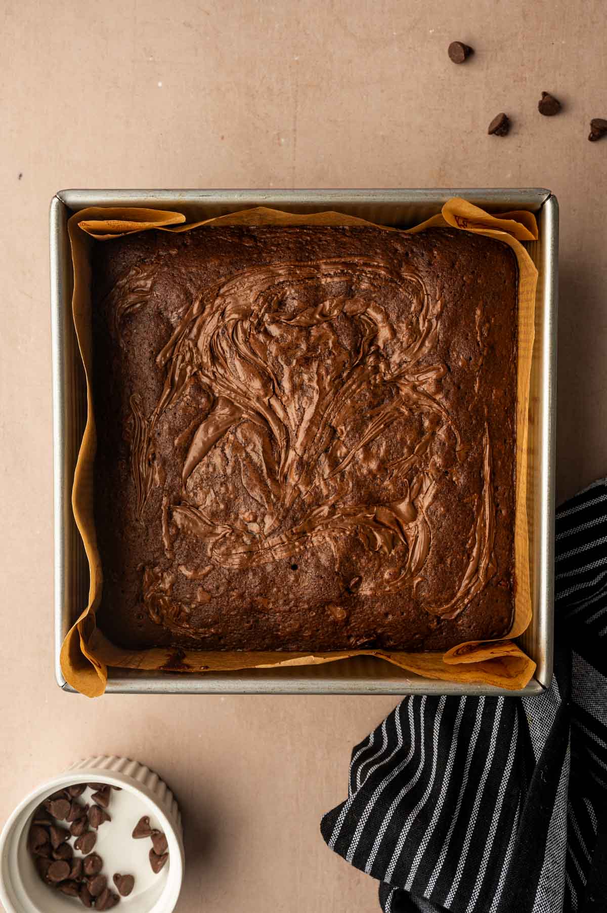 Freshly baked Nutella brownies cooling in a baking pan